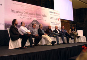 Image of the speakers at a conference in Dubai