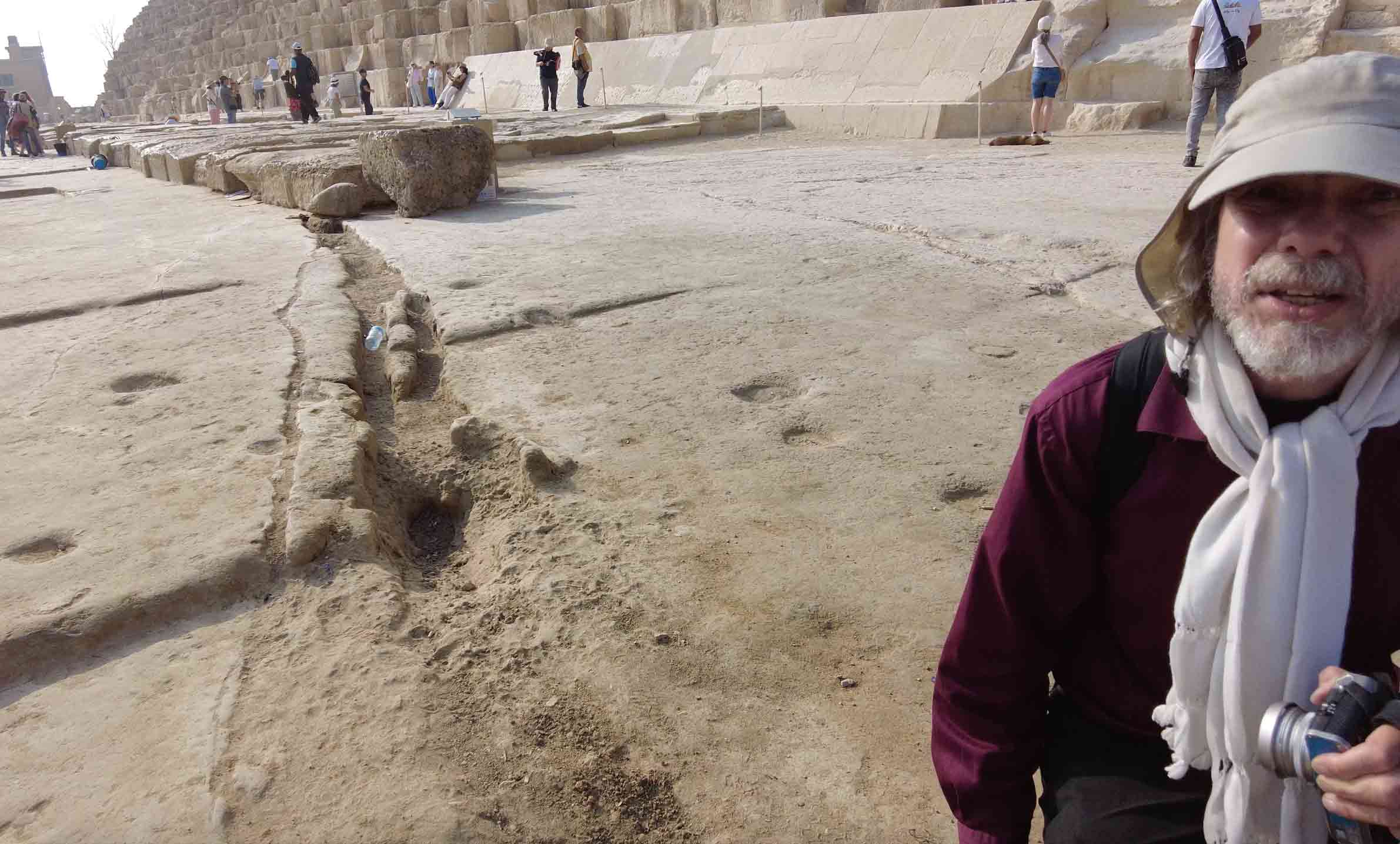 Image of Robert Schoch beside the remnants of a large Lichtenberg channel emanating from
the north side of the Great Pyramid